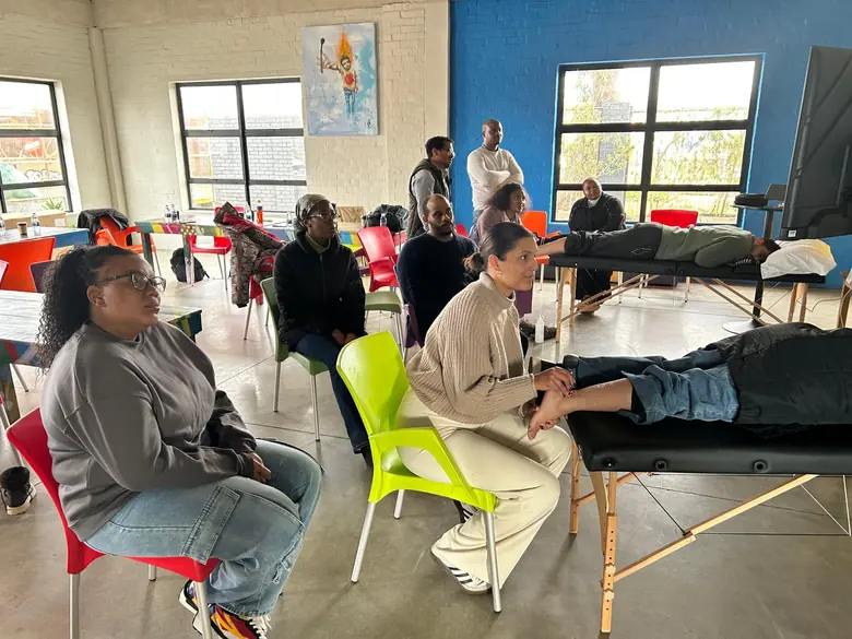 Workshop participants observing a live ultrasound demonstration