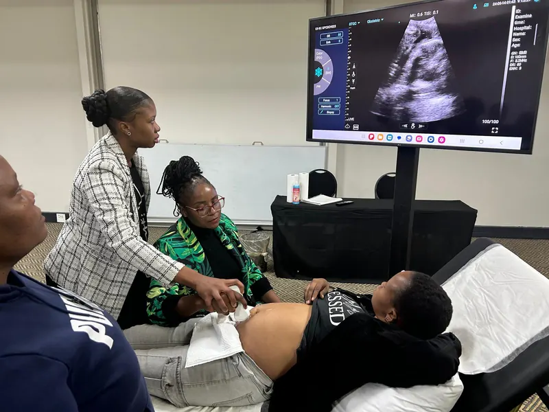 Obstetric scanning session with a clear fetal ultrasound image on screen
